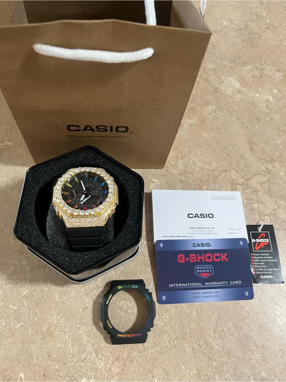 Casio Gold Crystal Bezel Watch with Black Dial and Multicolor Markers